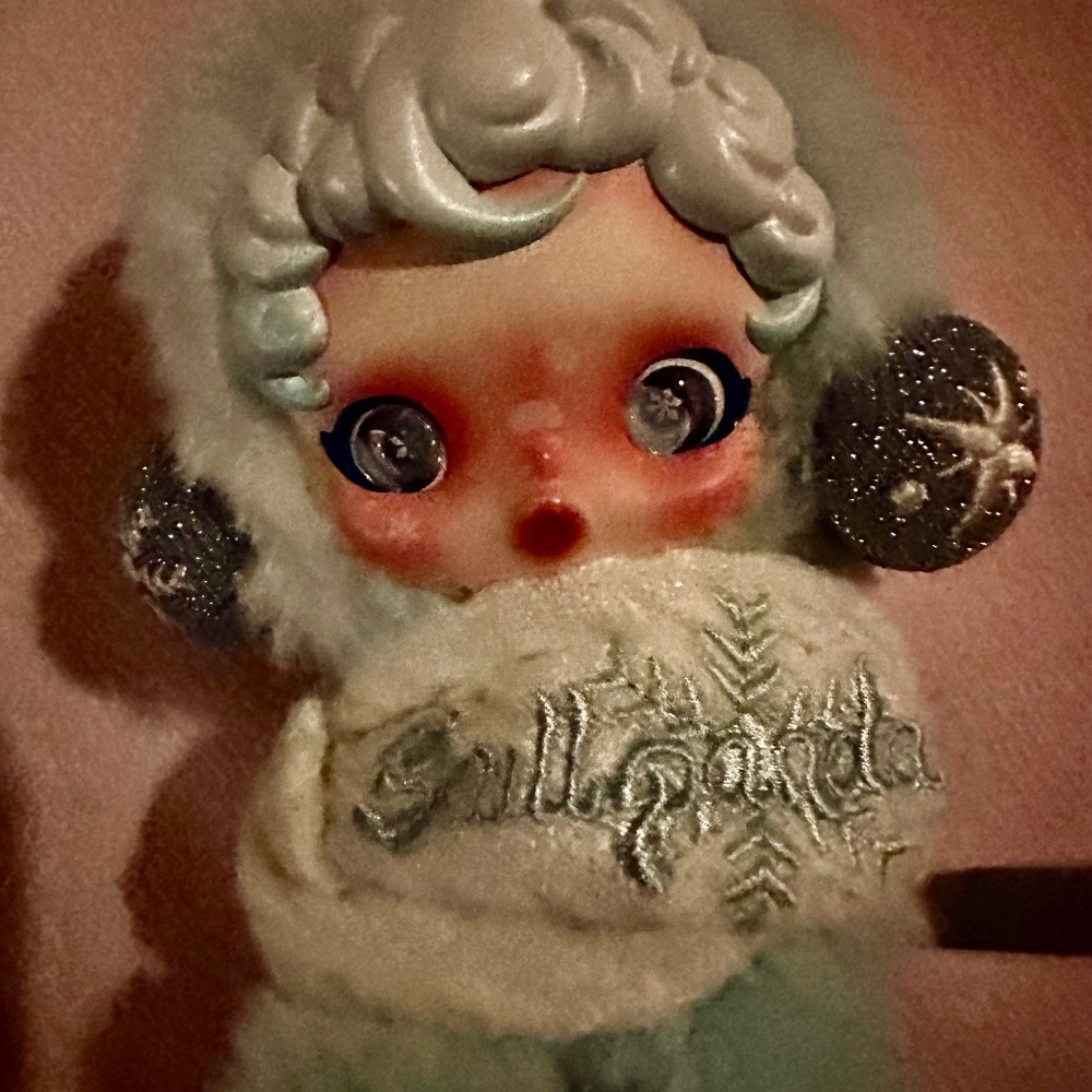Skullpanda “Song of Snow” plush doll charm from Popmart Winter Symphony